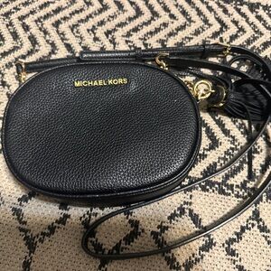 Michael Kors Black Pebbled Leather Oval Crossbody with Tassel